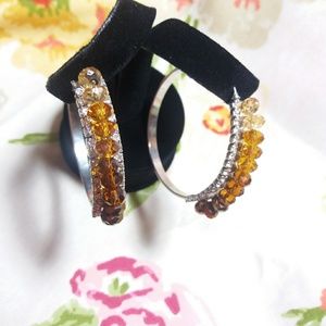 Silver tone hoop earrings beads and rhinestones